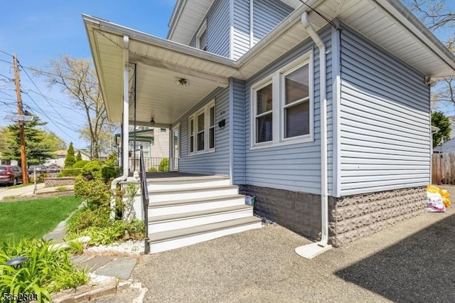 view of home's exterior with covered porch