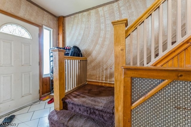 tiled entryway with wallpapered walls