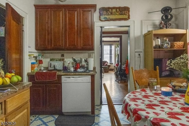 222 Van Buren St, Newark City, NJ 07105 - kitchen featuring white dishwasher and decorative backsplash