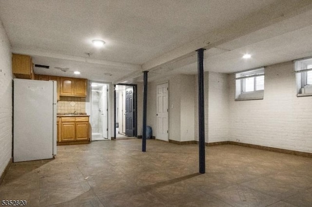 222 Van Buren St, Newark City, NJ 07105 - basement featuring baseboards and freestanding refrigerator