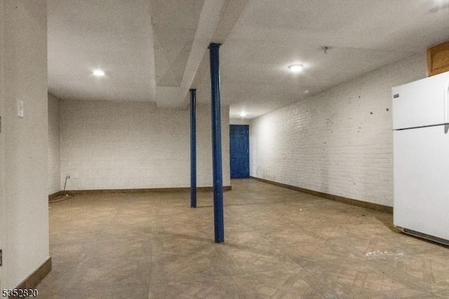 222 Van Buren St, Newark City, NJ 07105 - finished basement featuring baseboards and freestanding refrigerator