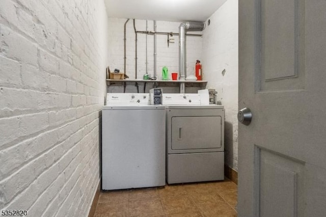 222 Van Buren St, Newark City, NJ 07105 - washroom featuring laundry area, washer and clothes dryer, and tile patterned flooring