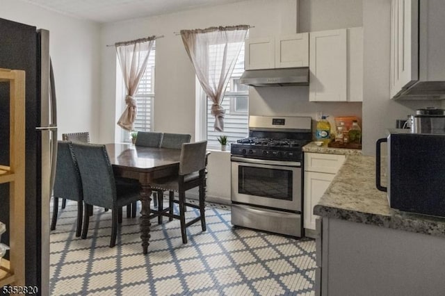 222 Van Buren St, Newark City, NJ 07105 - kitchen featuring white cabinets, stainless steel appliances, and under cabinet range hood