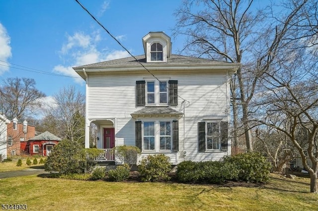 view of front of house with a front lawn
