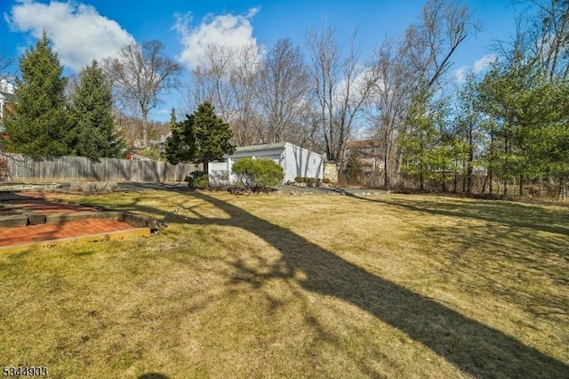 view of yard with fence