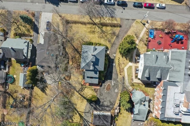 birds eye view of property with a residential view