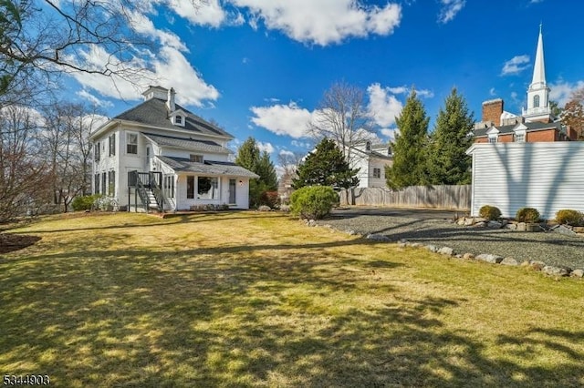 view of yard featuring fence