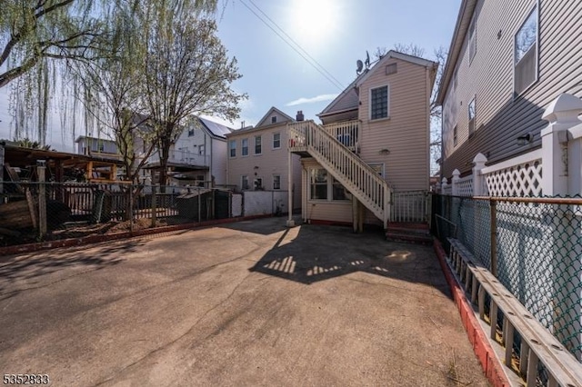 76 Kossuth St, Newark City, NJ 07105 - rear view of house with stairs and fence