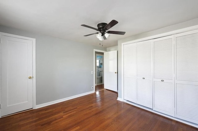 unfurnished bedroom featuring baseboards, a ceiling fan, a closet, and wood finished floors