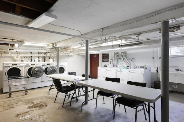unfinished basement featuring washing machine and dryer