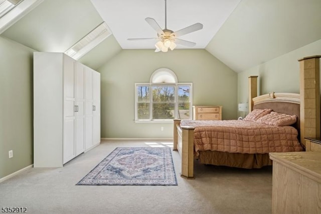 bedroom featuring lofted ceiling, ceiling fan, baseboards, and light colored carpet