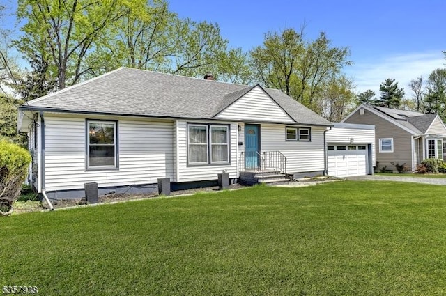 bungalow-style house with roof with shingles, a front lawn, a garage, a chimney, and driveway