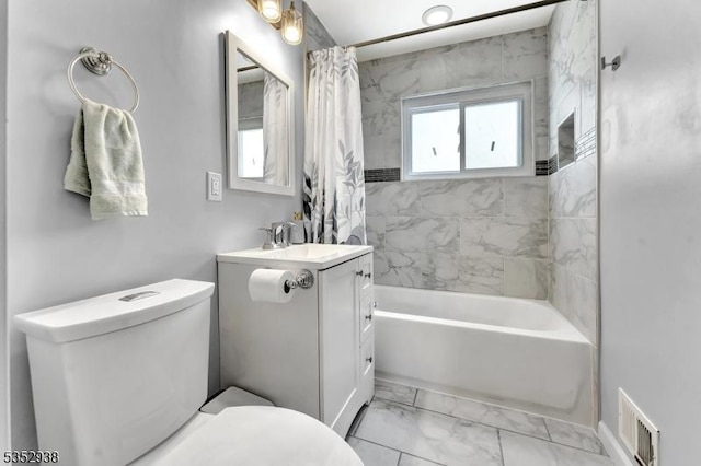 bathroom with visible vents, vanity, marble finish floor, toilet, and shower / bathtub combination with curtain