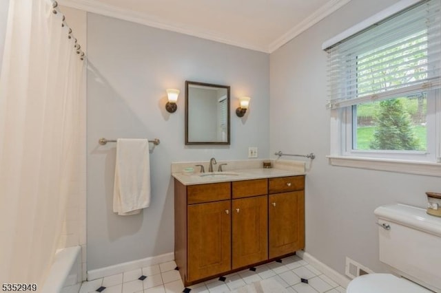 full bathroom featuring vanity, ornamental molding, baseboards, and toilet