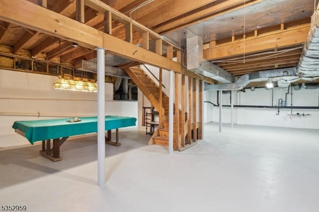 unfinished below grade area featuring stairs and billiards