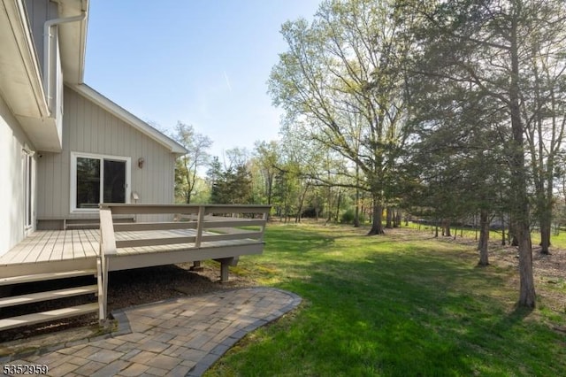view of yard with a deck