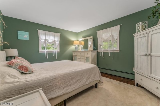 4 Broad View Pl, Raritan Twp, NJ 08822 - bedroom with a baseboard radiator, multiple windows, and wood finished floors