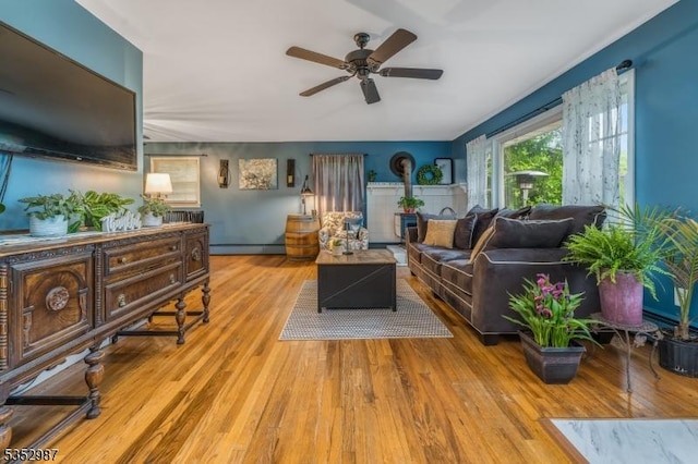 4 Broad View Pl, Raritan Twp, NJ 08822 - living room with a baseboard radiator, a ceiling fan, and wood finished floors