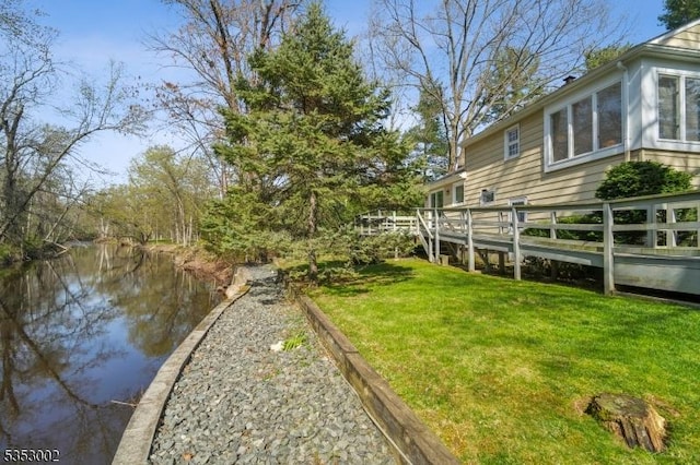 view of yard featuring a water view