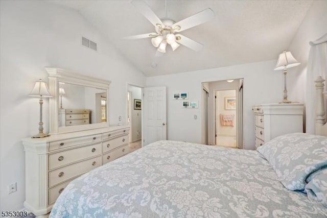 bedroom featuring vaulted ceiling and ceiling fan