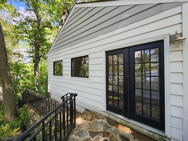 7 Raccoon Island Rd, Jefferson Twp, NJ 07849 - view of exterior entry featuring french doors