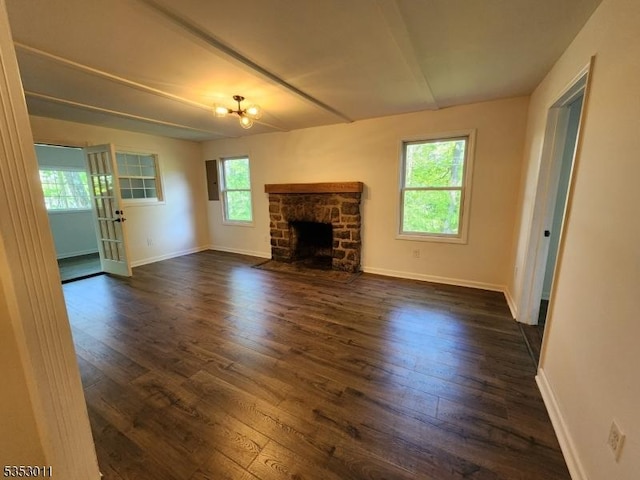 7 Raccoon Island Rd, Jefferson Twp, NJ 07849 - unfurnished living room featuring dark wood-style floors, baseboards, a fireplace, and a chandelier