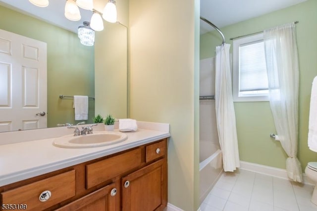 bathroom featuring vanity, toilet, baseboards, shower / bathtub combination with curtain, and tile patterned floors
