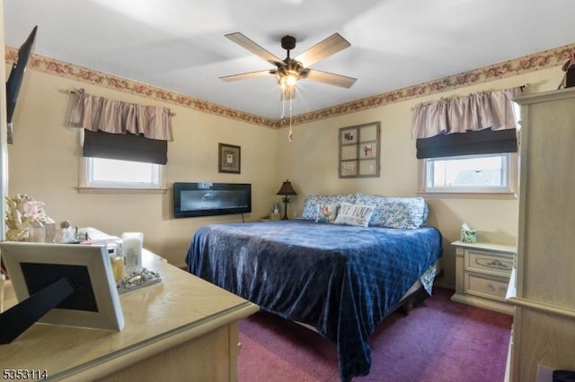 bedroom with ceiling fan and carpet