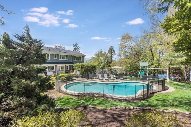 25 Morningside Dr, Livingston Twp, NJ 07039 - view of swimming pool featuring fence and a playground