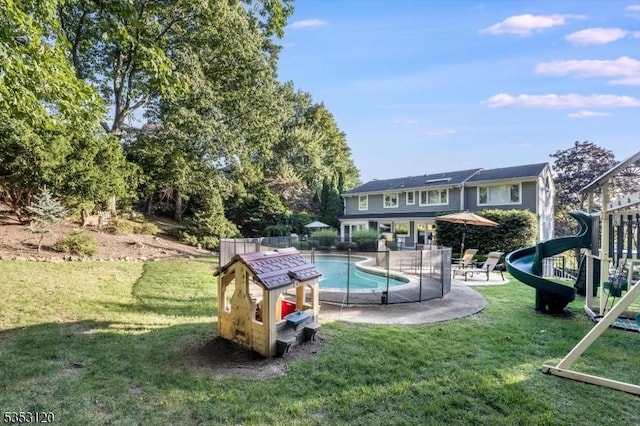 25 Morningside Dr, Livingston Twp, NJ 07039 - view of swimming pool with a lawn, a patio area, and a water slide