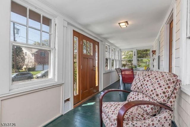 interior space featuring a wealth of natural light and wood finished floors