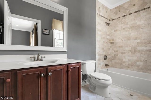 full bathroom featuring tile patterned flooring, bathtub / shower combination, vanity, toilet, and ornamental molding