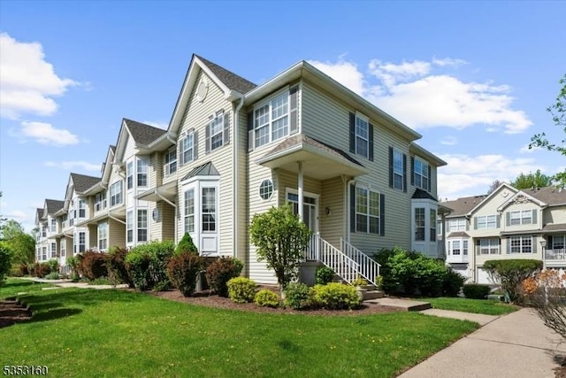 view of front facade with a front yard