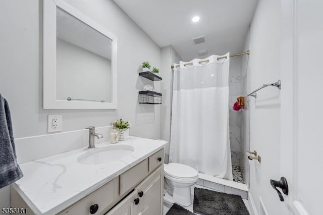 full bathroom with tile patterned flooring, vanity, toilet, a shower stall, and visible vents