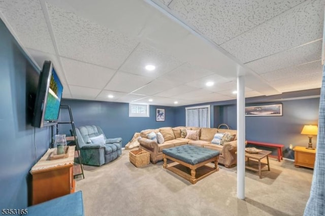 living area featuring recessed lighting, carpet floors, and a paneled ceiling