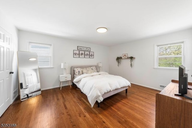 1077 Allenwood Dr, Plainfield City, NJ 07060 - bedroom featuring baseboards, visible vents, and wood finished floors