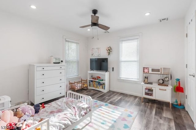 bedroom featuring recessed lighting, visible vents, multiple windows, and wood finished floors