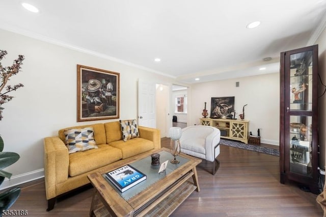 living room with recessed lighting, baseboards, and ornamental molding