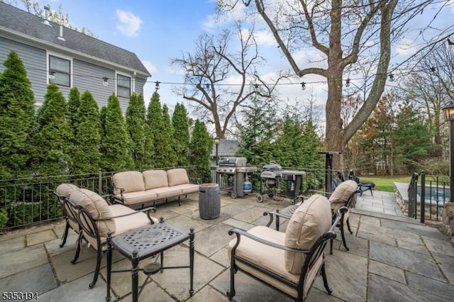 view of patio / terrace featuring outdoor lounge area and area for grilling