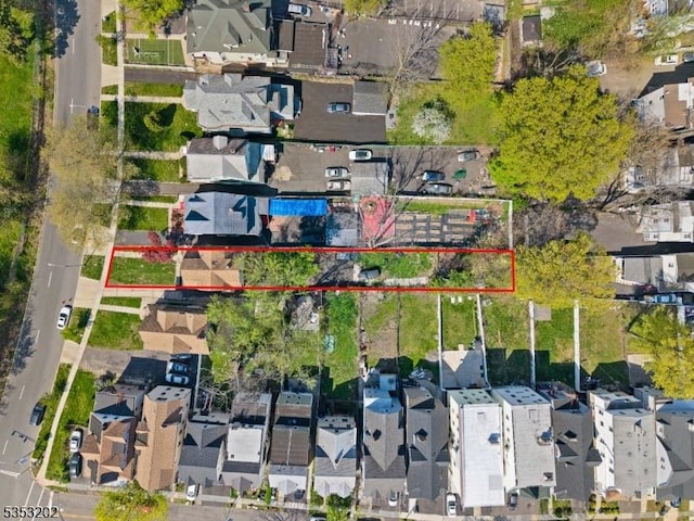 aerial overview of property's location with property parcel outlined