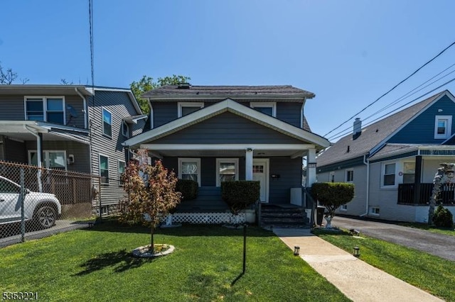 1529 Compton Ter, Hillside Twp, NJ 07205 - view of front of home with a porch and a front lawn