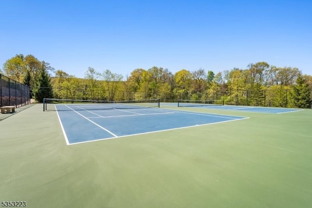 view of sport court with fence and community basketball court