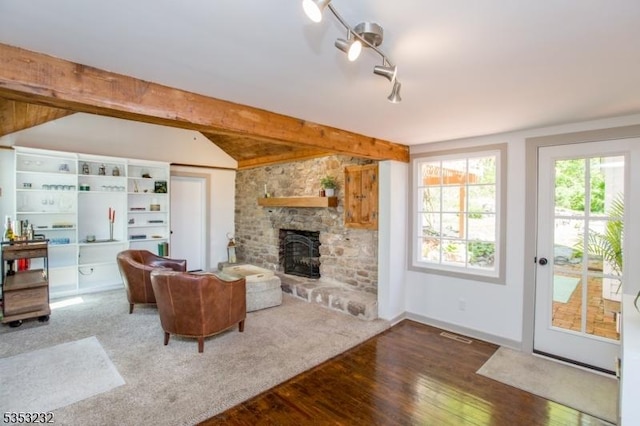 2252 Daniel Bray Hwy, Kingwood Twp, NJ 08559 - living area featuring beamed ceiling, a fireplace, and wood finished floors