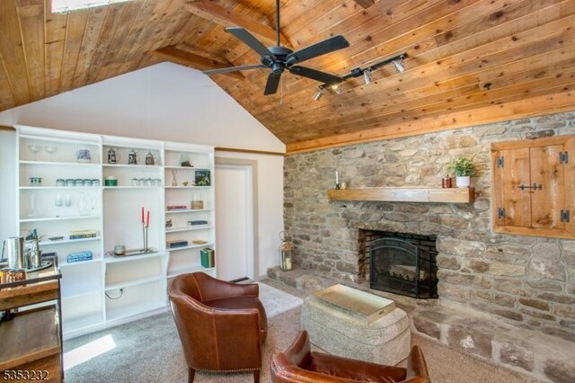 2252 Daniel Bray Hwy, Kingwood Twp, NJ 08559 - carpeted living room featuring ceiling fan, a stone fireplace, wood ceiling, and high vaulted ceiling