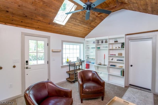 2252 Daniel Bray Hwy, Kingwood Twp, NJ 08559 - living area with carpet floors, a ceiling fan, baseboards, wooden ceiling, and a skylight