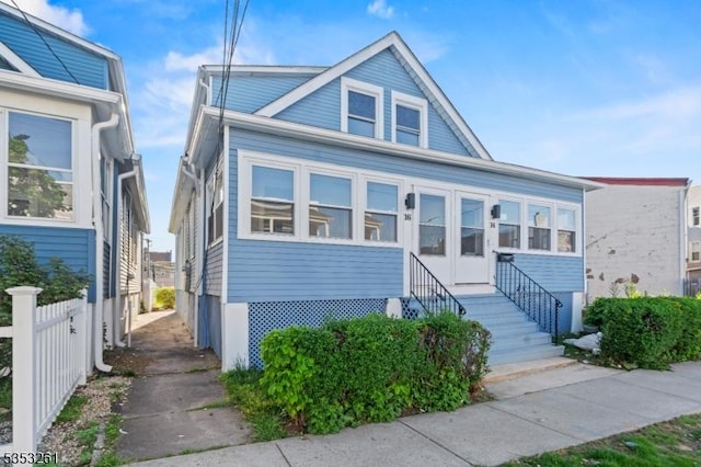 bungalow with fence and entry steps