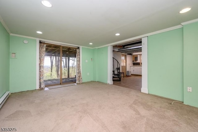 unfurnished room with crown molding, recessed lighting, carpet floors, and baseboard heating