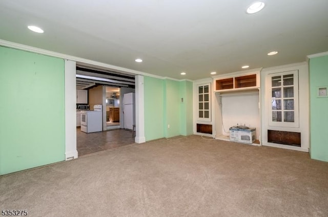 unfurnished living room with carpet flooring, recessed lighting, and crown molding