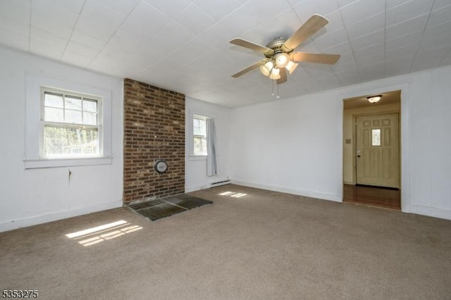 unfurnished living room featuring carpet floors, a baseboard radiator, ceiling fan, and baseboards