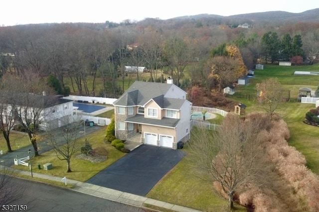 aerial view featuring a forest view